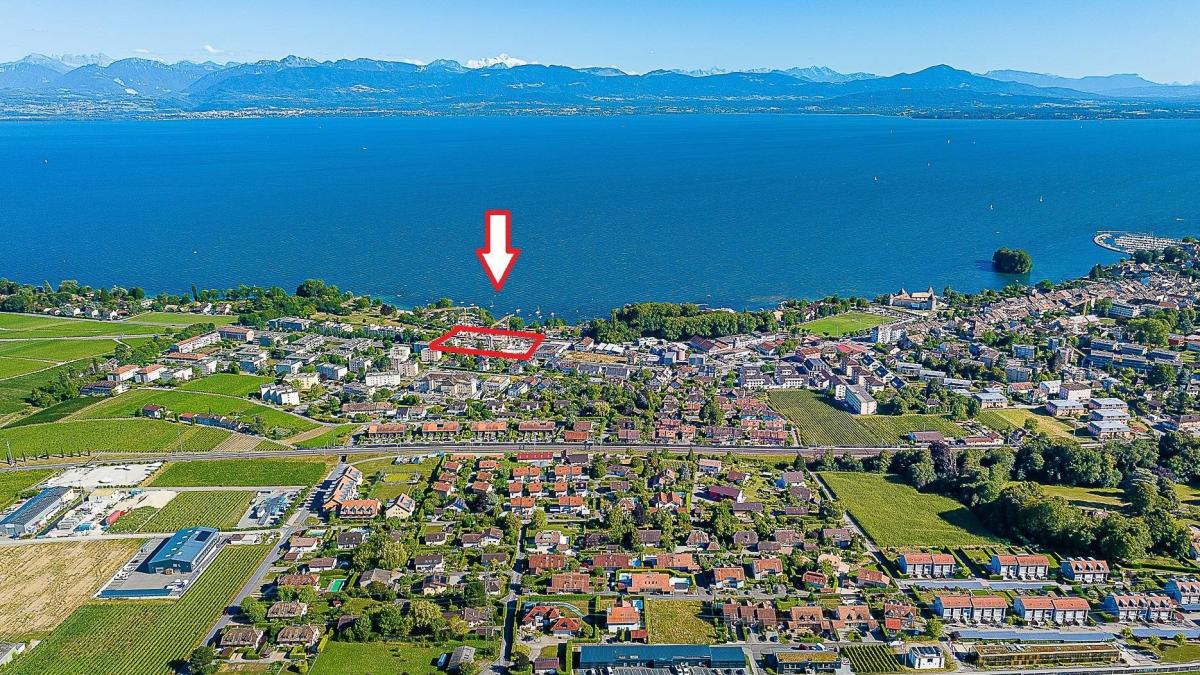 Luxueux 4.5 pièces traversant avec balcon couvert de 76m2 et vue lac