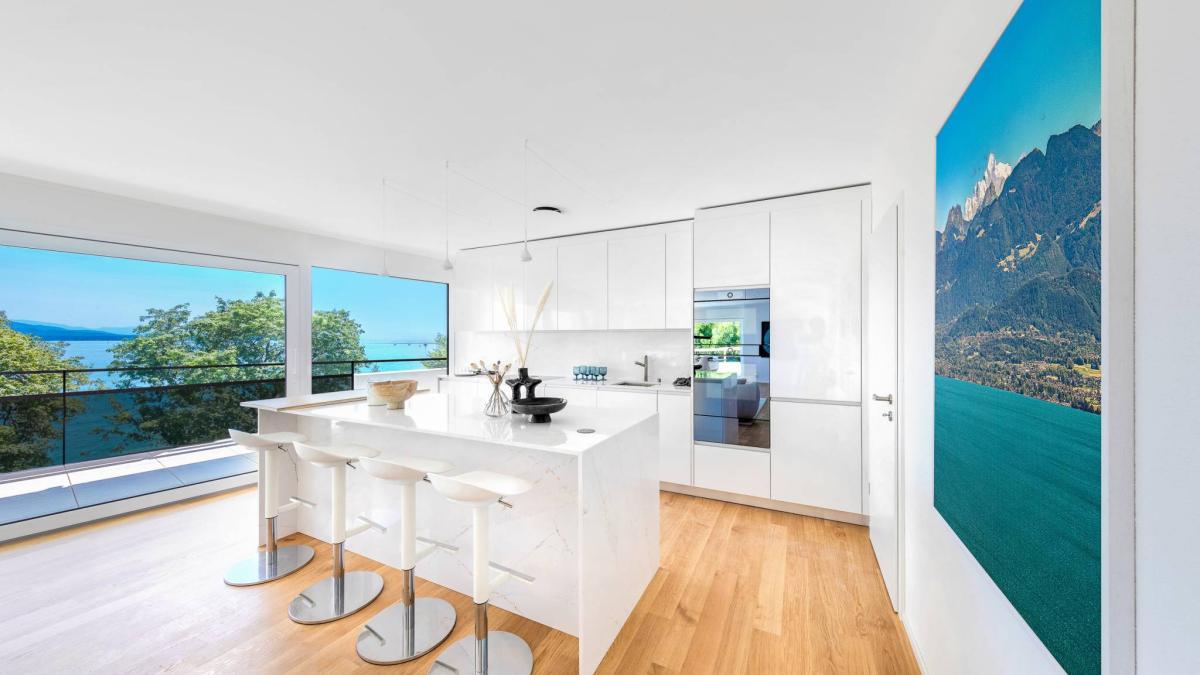 Luxueux 4.5 pièces traversant avec balcon couvert de 76m2 et vue lac