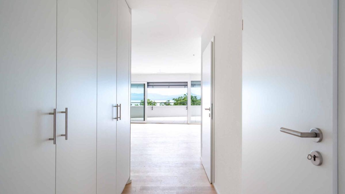 UNIQUE! Attique de 5.5 pièces de 180m2 bénéficiant d'un rooftop terrasse de 168m2 avec vue panoramique sur le lac et les Alpes