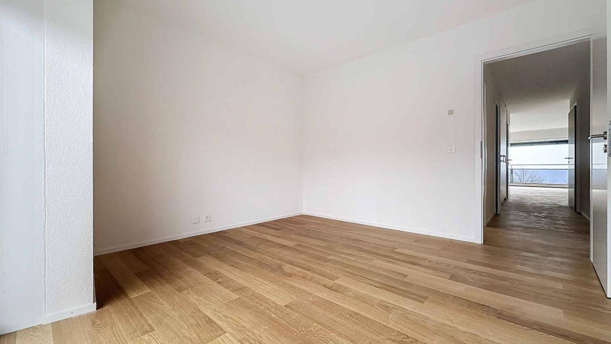 UNIQUE! Attique de 5.5 pièces de 180m2 bénéficiant d'un rooftop terrasse de 168m2 avec vue panoramique sur le lac et les Alpes