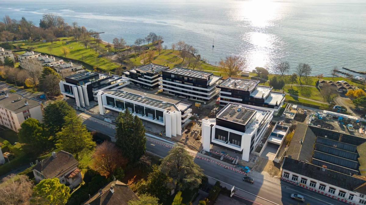 Luxueux 4.5 pièces traversant avec balcon couvert de 76m2 et vue lac