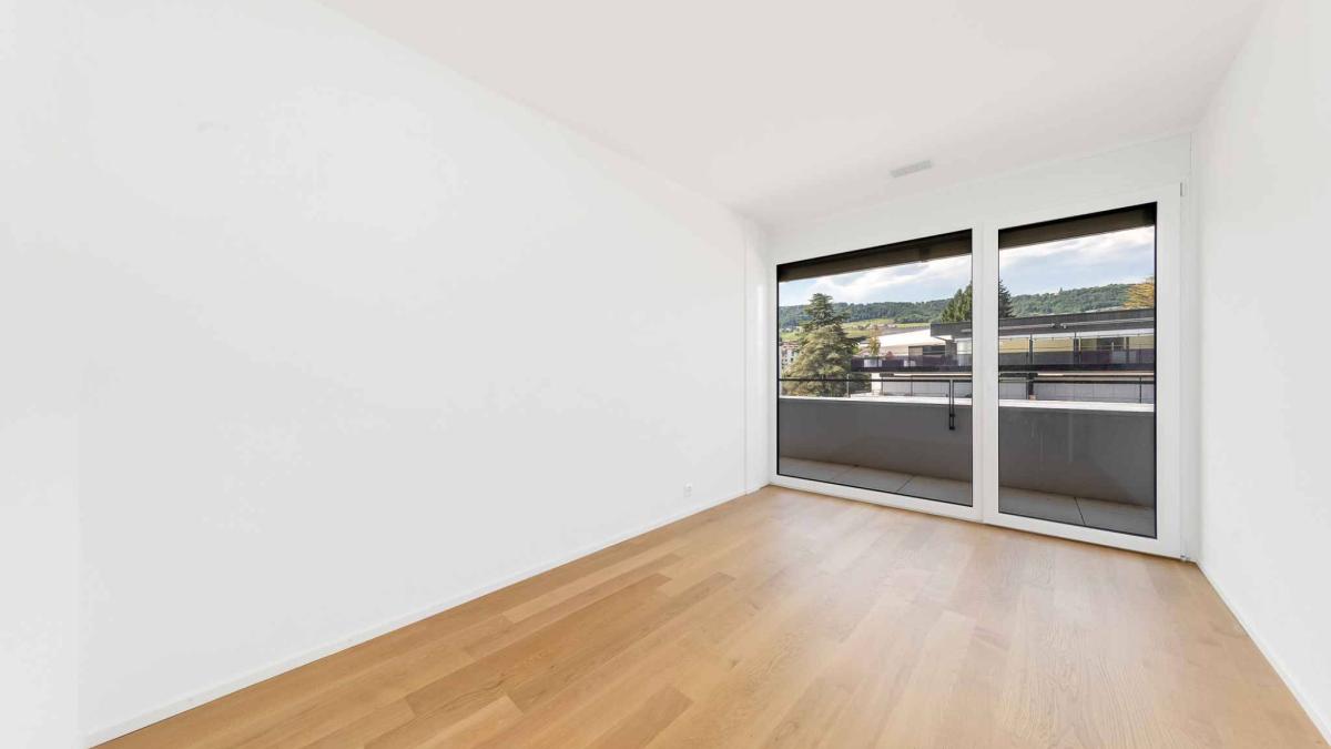 Luxueux 4.5 pièces traversant avec balcon couvert de 76m2 et vue lac