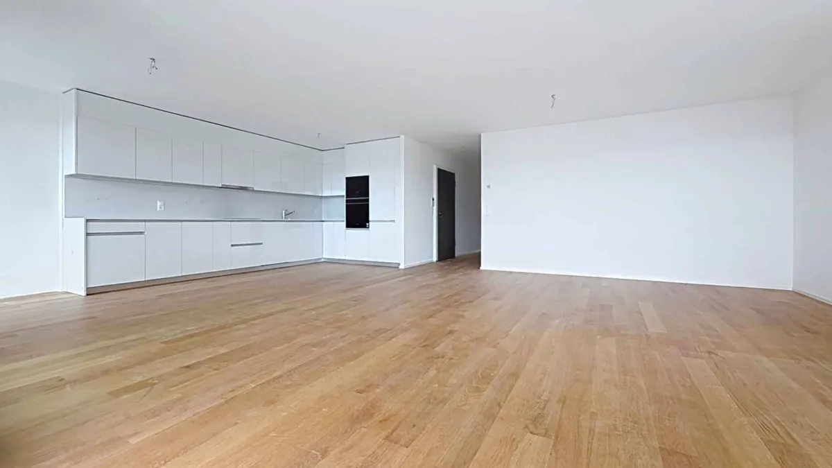 Luxueux 4.5 pièces traversant avec balcon couvert de 76m2 et vue lac