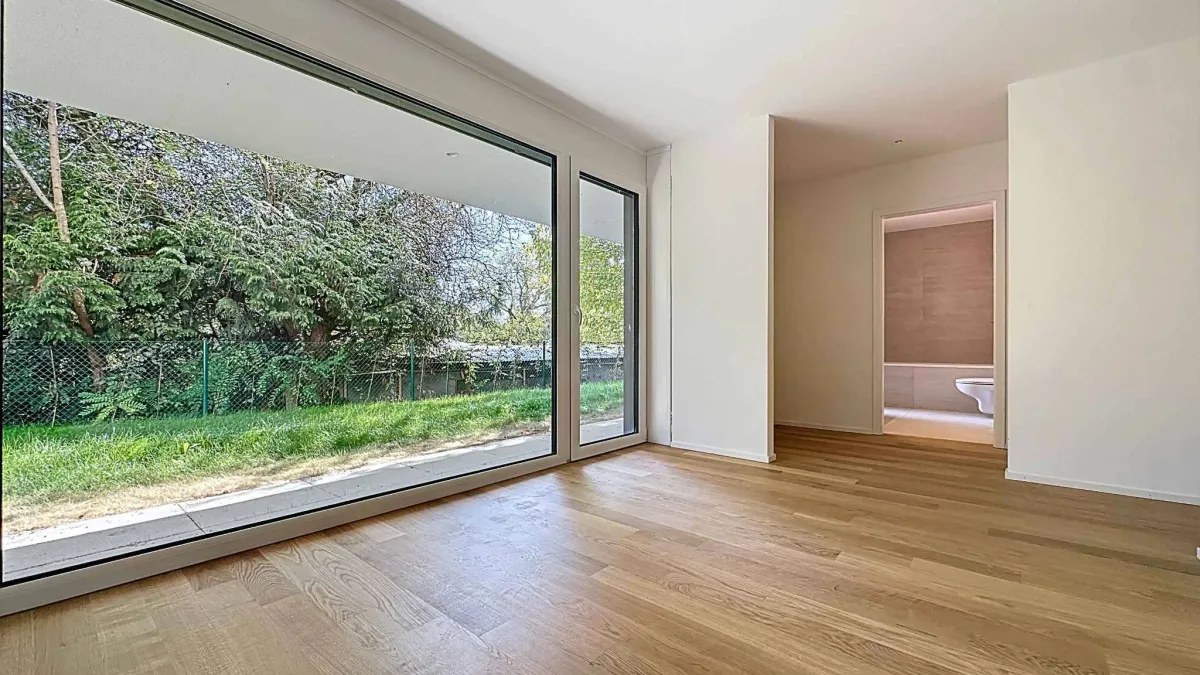 Exceptionnel 5.5 pièces au rez-de-chaussée avec terrasse et jardin privatif vue lac