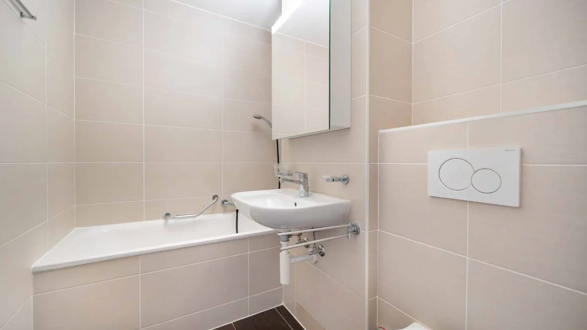 Bel appartement de 2,5 pièces 
en rez de jardin et plein centre ville !