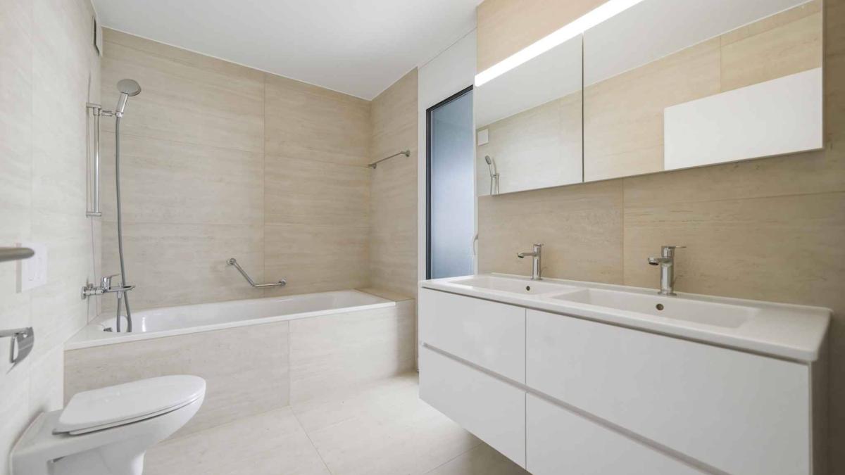 Appartement neuf de standing - 5.5 pièces en angle avec terrasse et jardin privatif
