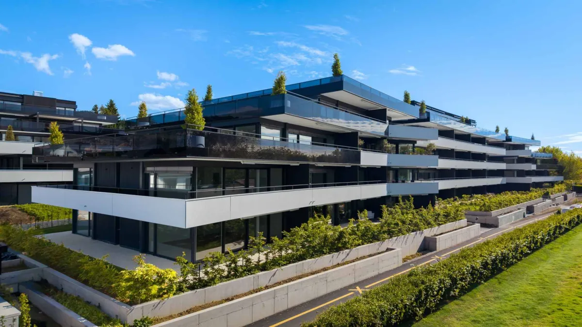Appartement neuf de standing - 5.5 pièces en angle avec terrasse et jardin privatif