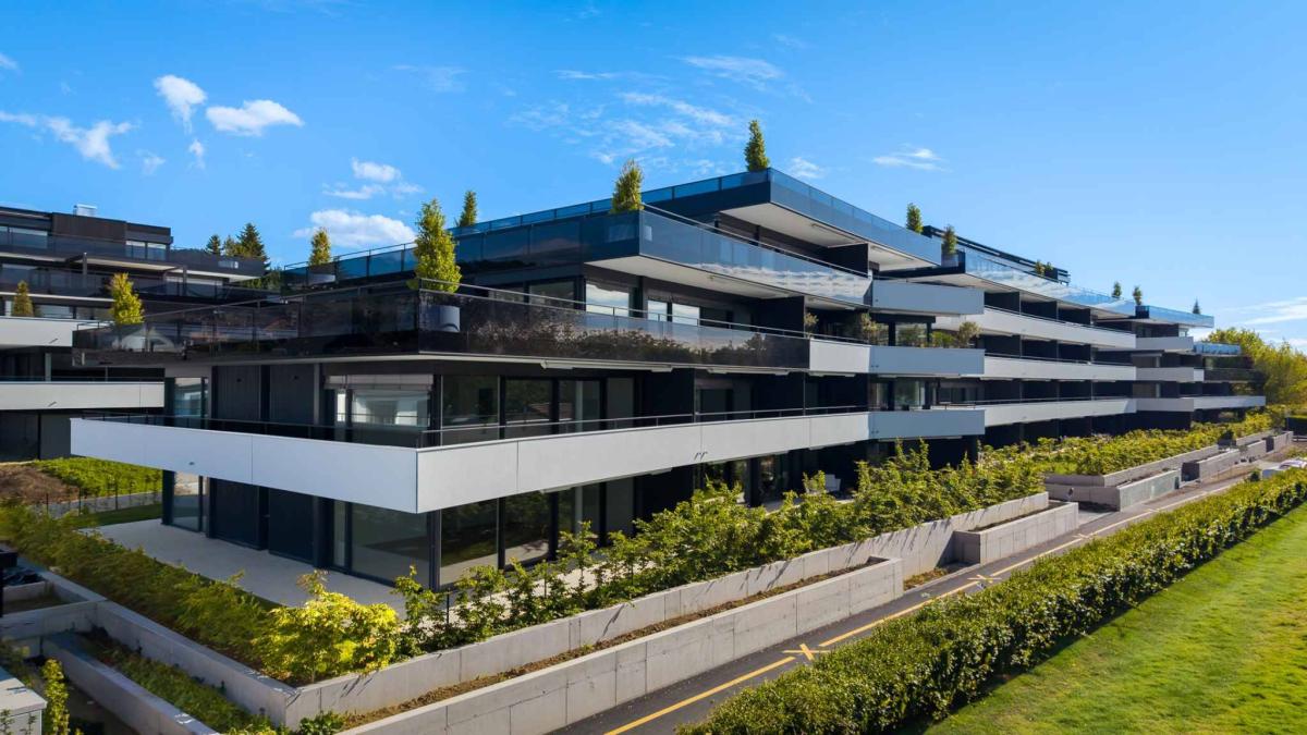 Appartement neuf de standing - 5.5 pièces en angle avec terrasse et jardin privatif