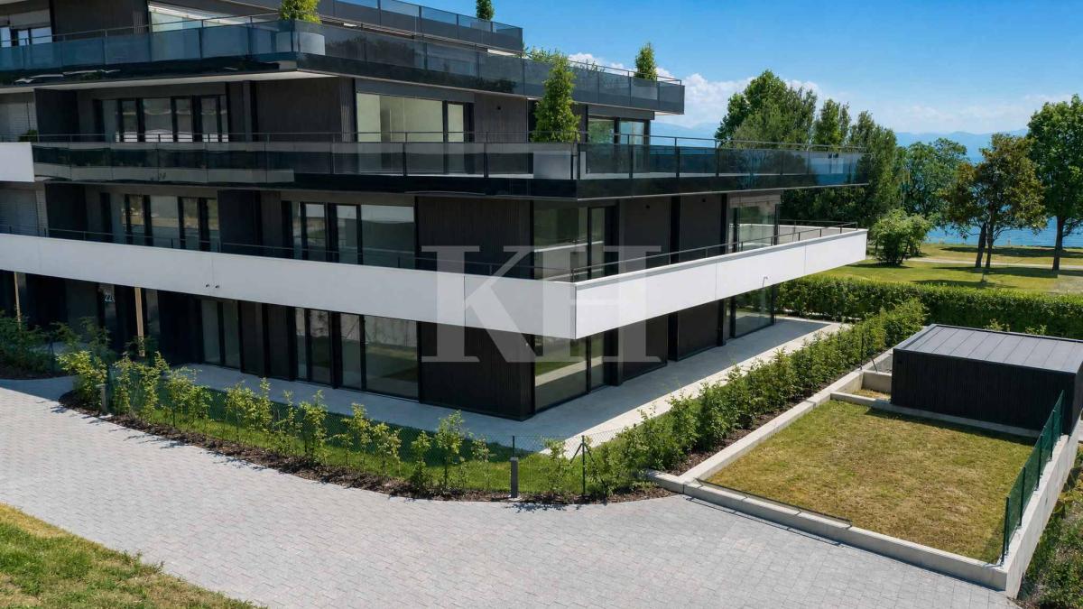 Appartement de 5,5 pièces neuf avec magnifiques finitions en rez de jardin !