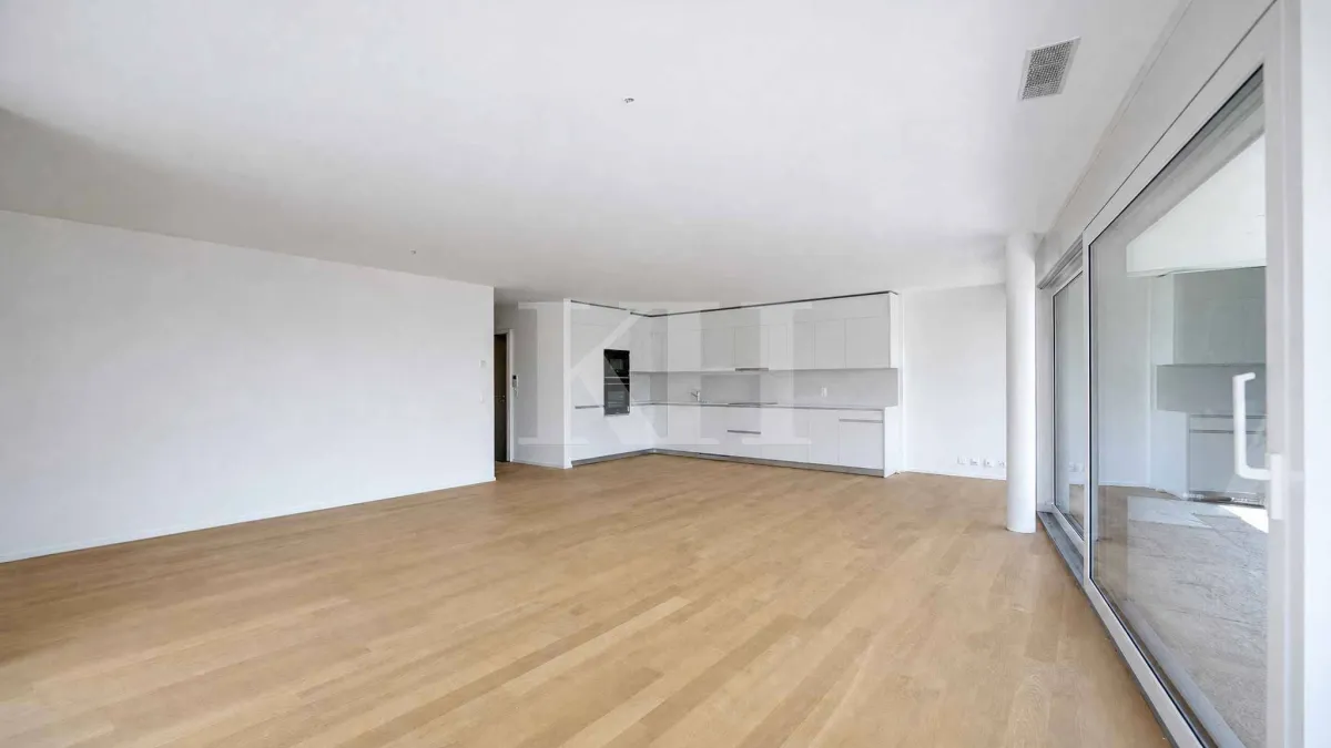 Appartement de 5,5 pièces neuf avec magnifiques finitions en rez de jardin !
