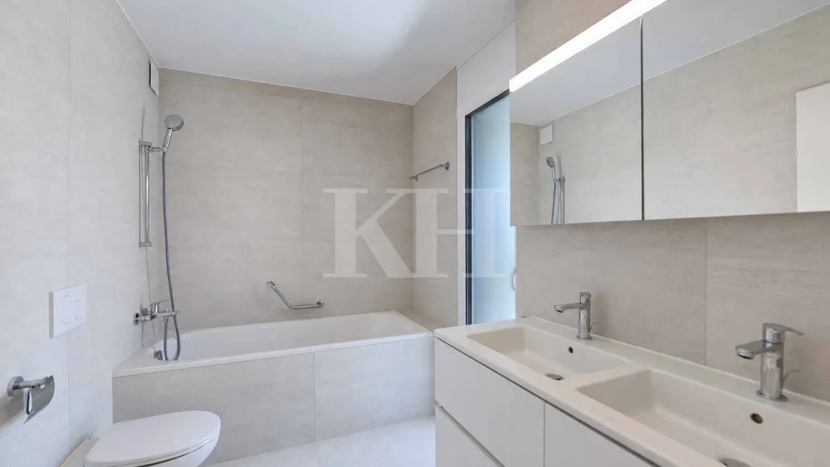 Appartement de 5,5 pièces neuf avec magnifiques finitions en rez de jardin !
