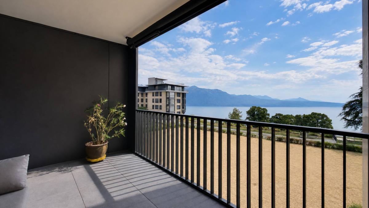 Bel appartement récent de 3.5 pièces avec grand balcon et vue sur le Lac 