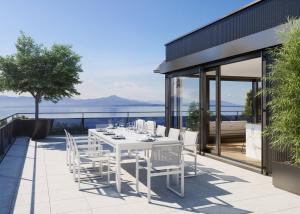 UNIQUE! Attique de 5.5 pièces de 180m2 bénéficiant d'un rooftop terrasse de 168m2 avec vue panoramique sur le lac et les Alpes