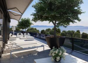 UNIQUE! Attique de 5.5 pièces de 180m2 bénéficiant d'un rooftop terrasse de 168m2 avec vue panoramique sur le lac et les Alpes