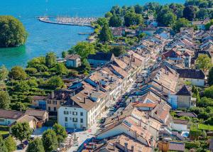 UNIQUE! Attique de 5.5 pièces de 180m2 bénéficiant d'un rooftop terrasse de 168m2 avec vue panoramique sur le lac et les Alpes