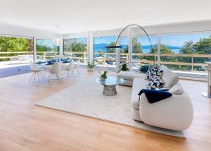 Luxueux 4.5 pièces traversant avec balcon couvert de 76m2 et vue lac