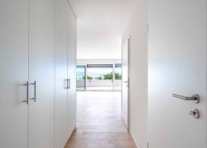 UNIQUE! Attique de 5.5 pièces de 180m2 bénéficiant d'un rooftop terrasse de 168m2 avec vue panoramique sur le lac et les Alpes