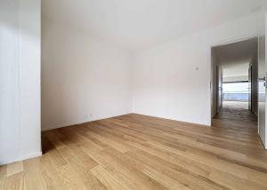 UNIQUE! Attique de 5.5 pièces de 180m2 bénéficiant d'un rooftop terrasse de 168m2 avec vue panoramique sur le lac et les Alpes