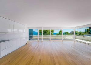 Luxueux 4.5 pièces traversant avec balcon couvert de 76m2 et vue lac