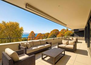 Luxueux 4.5 pièces traversant avec balcon couvert de 76m2 et vue lac