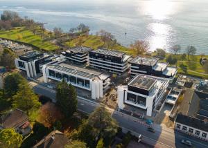 Luxueux 4.5 pièces traversant avec balcon couvert de 76m2 et vue lac