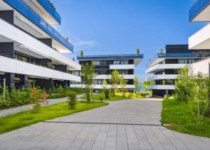 Appartement neuf de 3.5 pièces avec 2 terrasses et 2 jardins Ouest/Est
