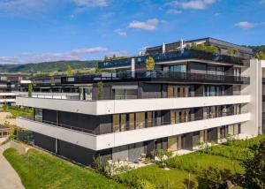 Appartement neuf de 2.5 pièces avec terrasse et jardin