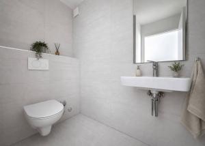 Appartement neuf de 2.5 pièces avec terrasse et jardin