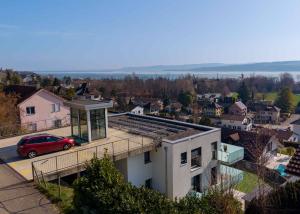 Duplex de 4.5 pièces avec sous-sol, jardin et vue sur le lac