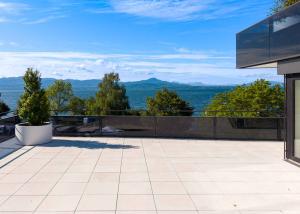 Appartement neuf de 5.5 pièces avec balcon couvert et rooftop terrasse