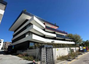 UNIQUE ! Attique neuf de 5.5 pièces bénéficiant d'un rooftop terrasse