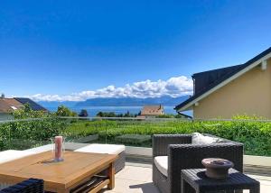 Propriété d’exception avec vue sur le lac et les Alpes