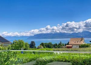 Propriété d’exception avec vue sur le lac et les Alpes