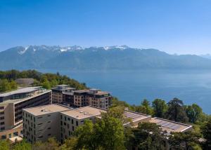 Véritable petit bijou de 2.5 p avec grand balcon et vue époustouflante sur le Lac