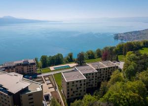 Véritable petit bijou de 2.5 p avec grand balcon et vue époustouflante sur le Lac