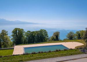 Véritable petit bijou de 2.5 p avec grand balcon et vue époustouflante sur le Lac
