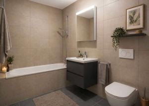 Appartement 3,5 pièces neuf en rez-de-jardin avec terrasse.