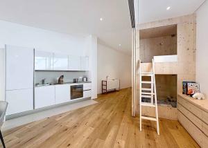 2.5 pièces Style Loft avec Loggia - Ultra Centré