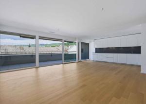 Appartement neuf traversant de 4.5 pièces avec deux balcons
