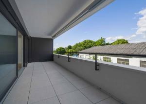 Appartement neuf traversant de 4.5 pièces avec deux balcons