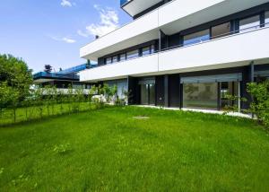Appartement neuf de 3.5 pièces avec avec doubles espaces extérieurs