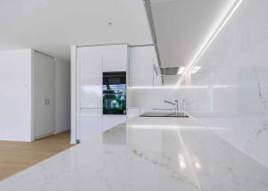 Appartement neuf de standing - 5.5 pièces en angle avec terrasse et jardin privatif
