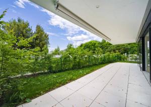 Appartement neuf de standing - 5.5 pièces en angle avec terrasse et jardin privatif