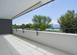 Appartement neuf de standing - 4.5 pièces en angle avec balcon de 76m² - Vue lac