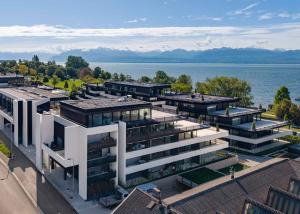 Appartement neuf de standing - 4.5 pièces en angle avec balcon de 76m² - Vue lac