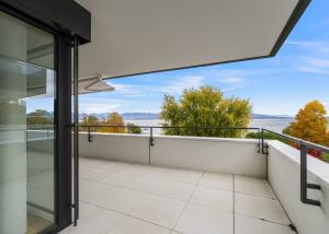 Appartement neuf de standing - 4.5 pièces en angle avec balcon de 76m² - Vue lac