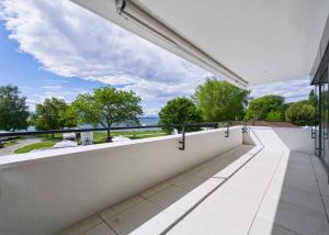 Appartement neuf traversant de 3.5 pièces avec deux balcons - Vue lac Léman
