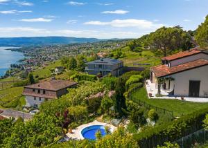 Élégante villa provençale avec piscine et vue panoramique sur le lac Léman et les Alpes