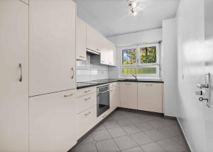 Appartement spacieux de 4,5 pièces avec jardin à Pully