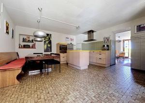Maison de 6.5 pièces avec potentiel de construction